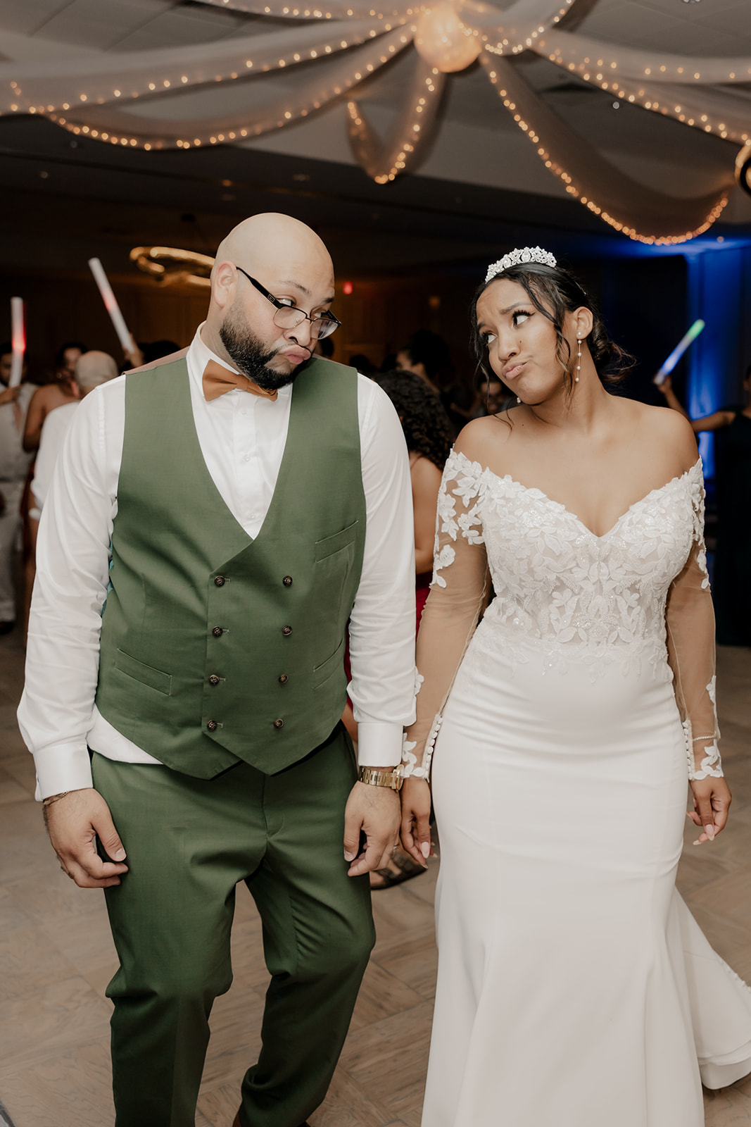 bride and groom dance together during their wedding reception