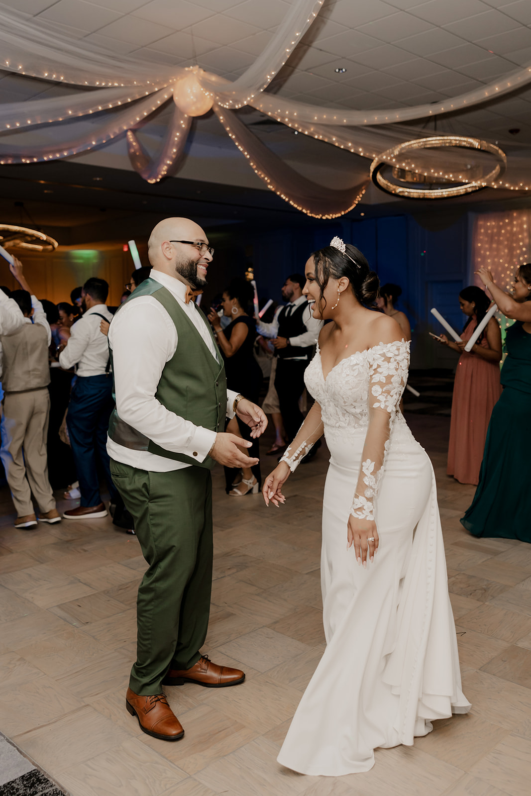 bride and groom dance together during their wedding reception