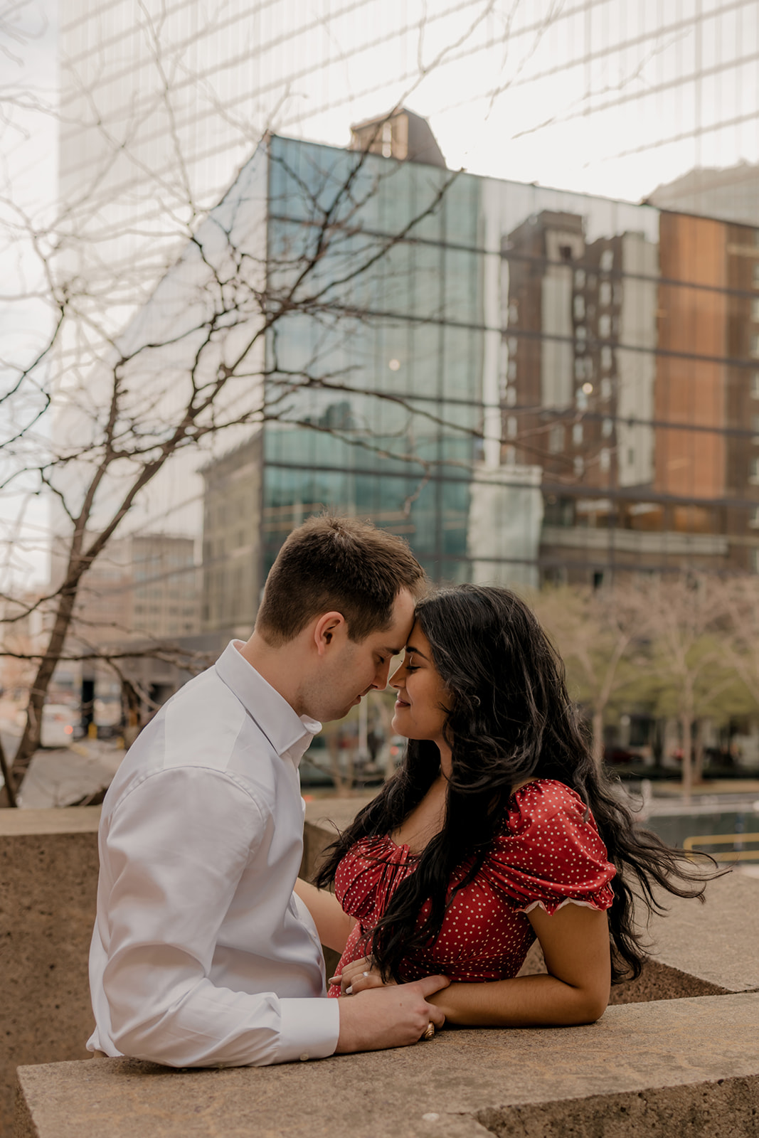 a dreamy engagement with the Boston skyline in the background learn what to do after an engagement here! 