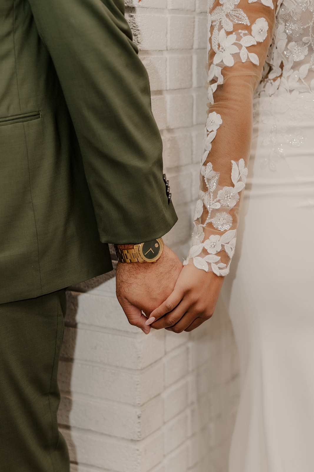 beautiful couple do a private vow and first touch ceremony around a corner 