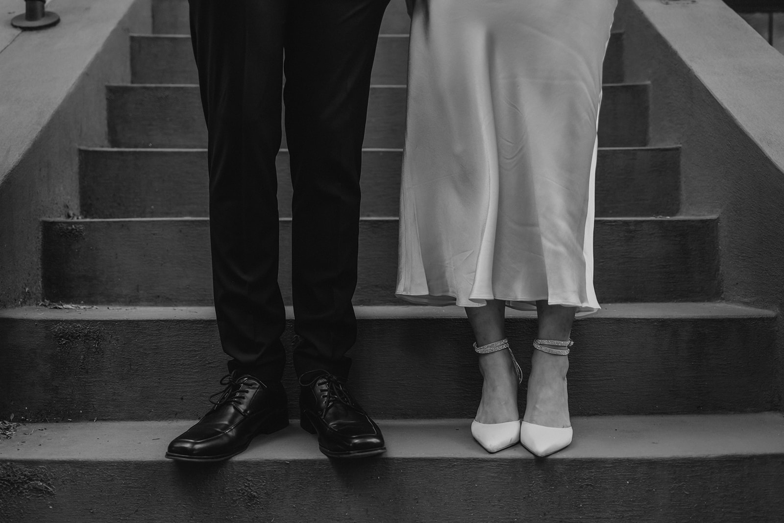 detail shot of a bride and grooms shoes on their timeless elopement day