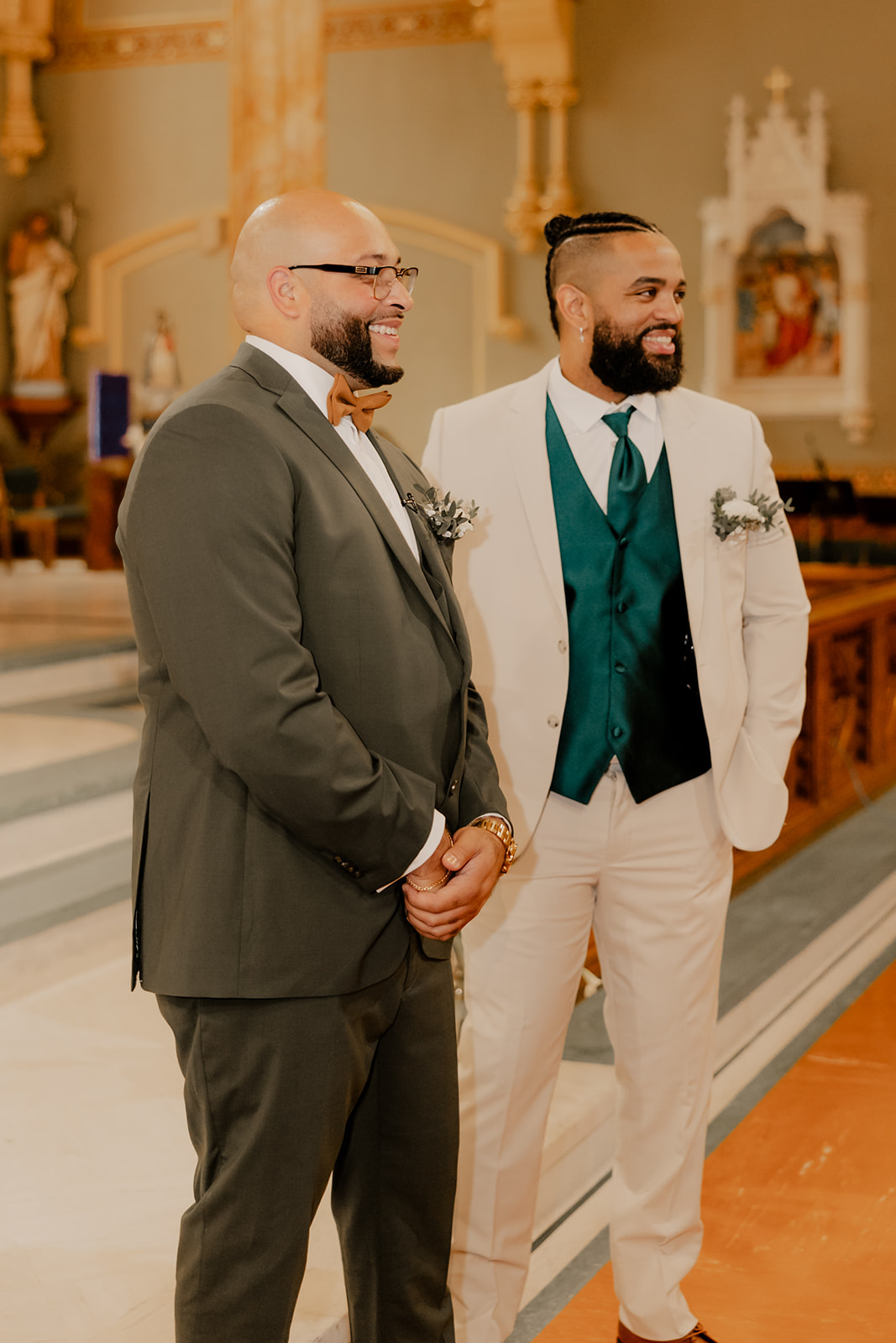 groom and groomsmen share a smile while the beautiful bride walks down the aisle