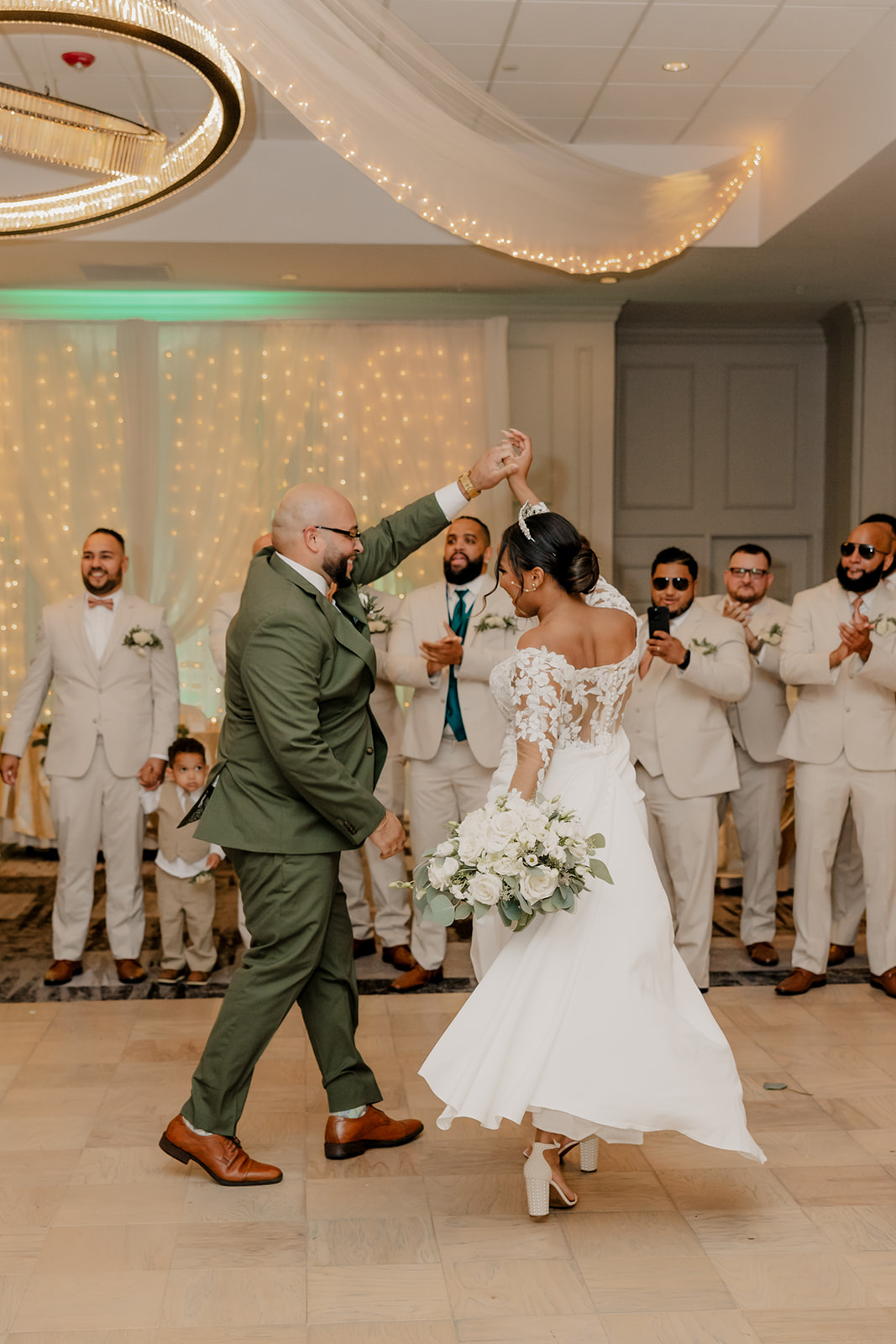 bride and groom share their first dance together 