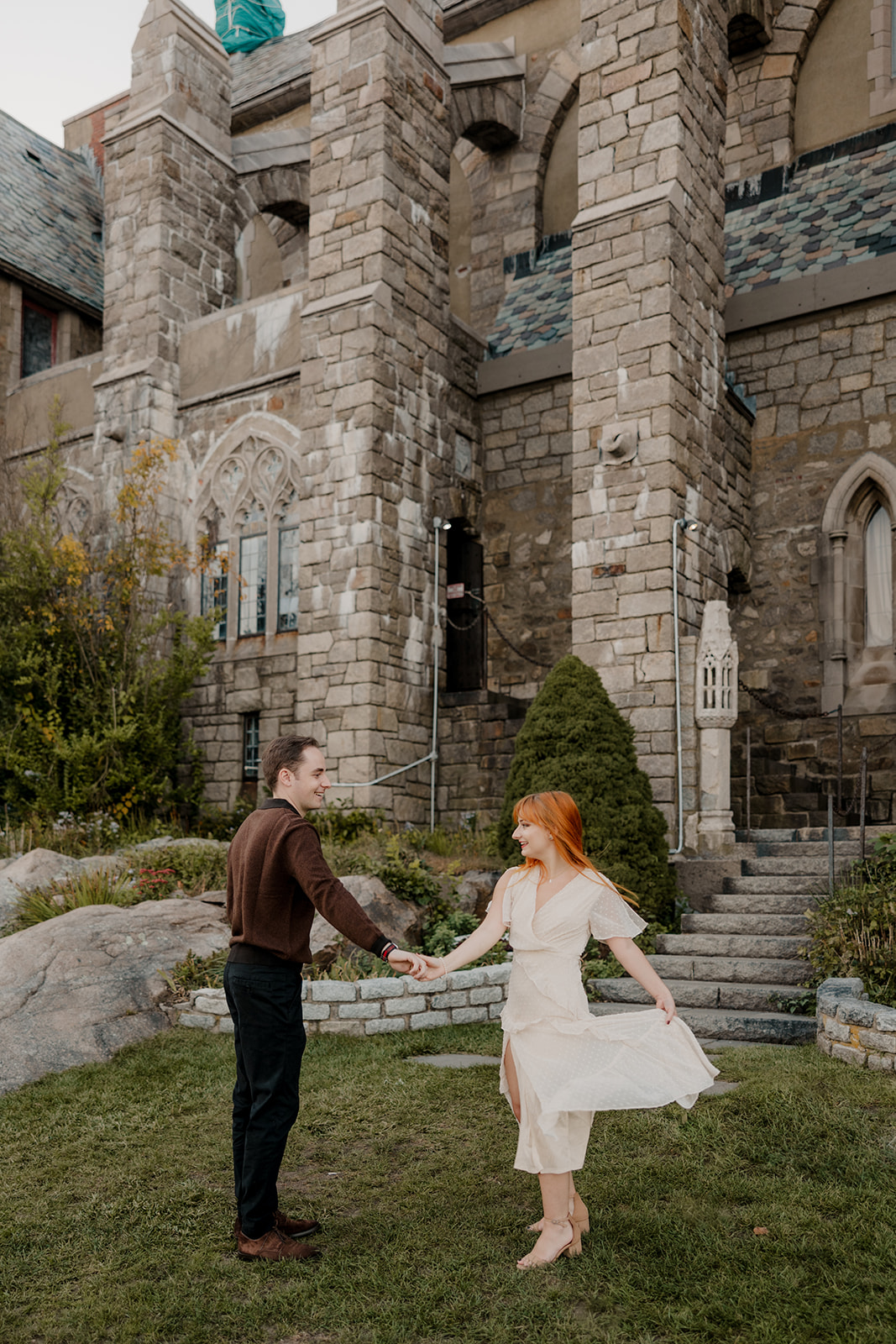 beautiful couple dance outside the  castle 