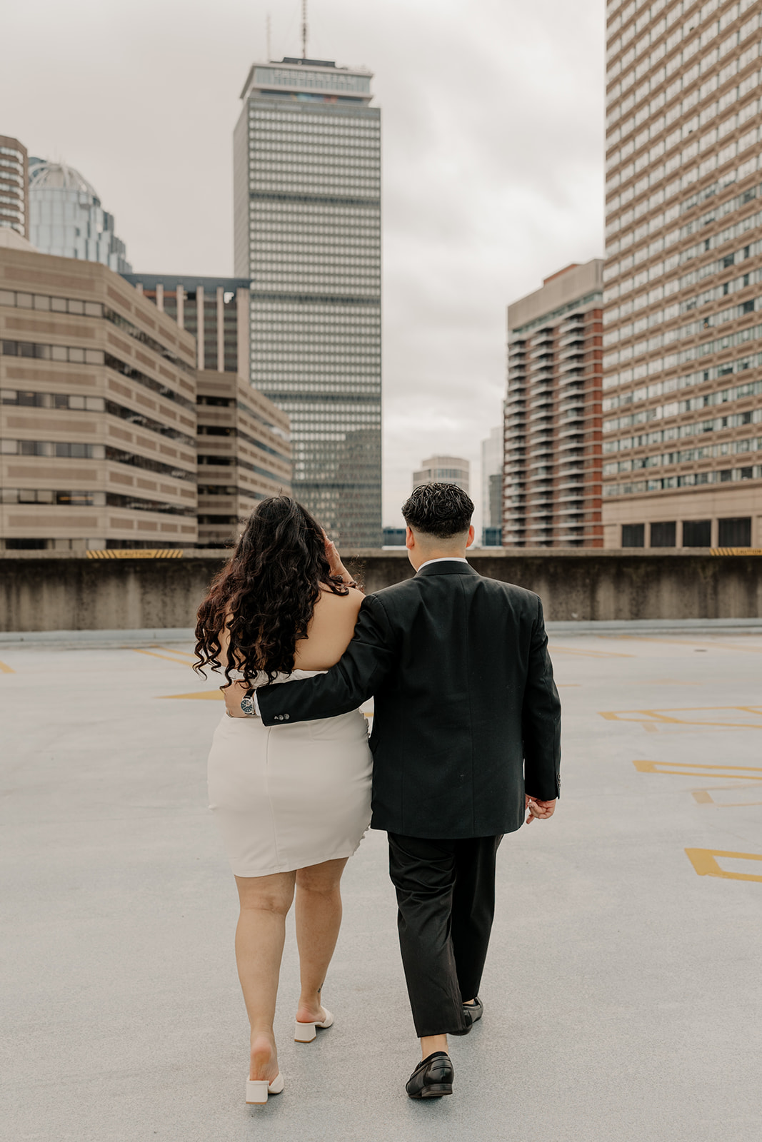 Boston engagement photos with the downtown skyline in the background