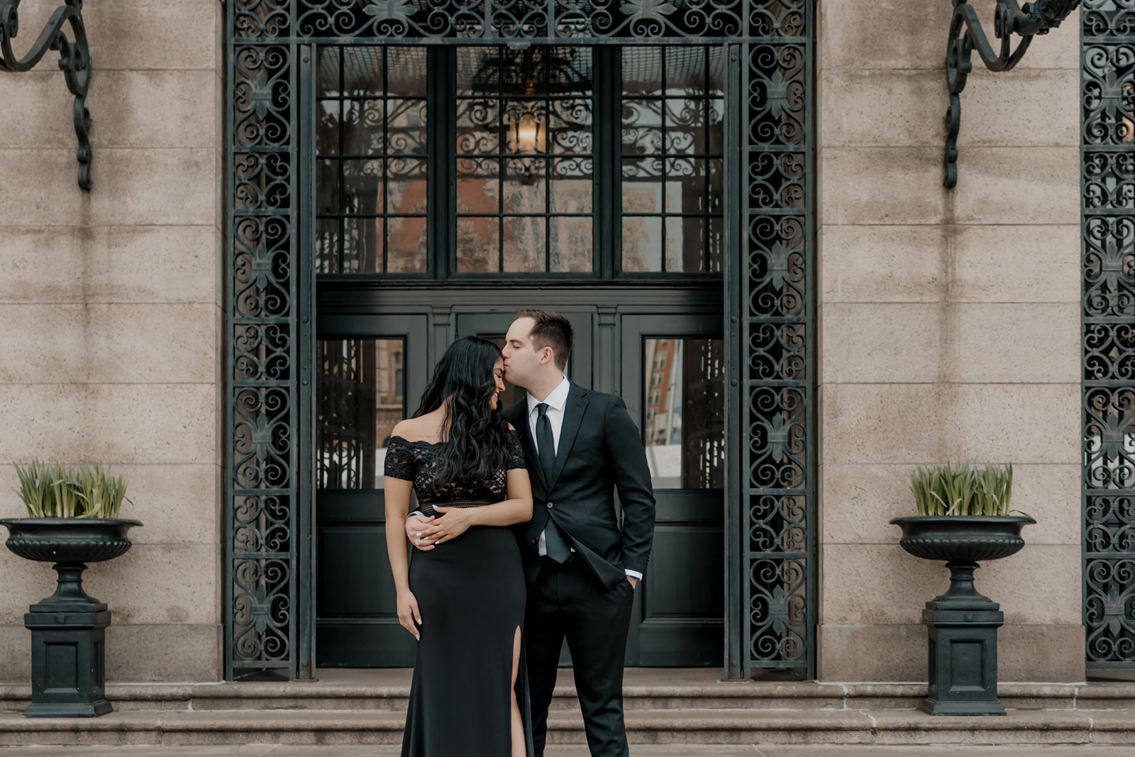 stunning couple pose with the beautiful Boston architecture in the background 