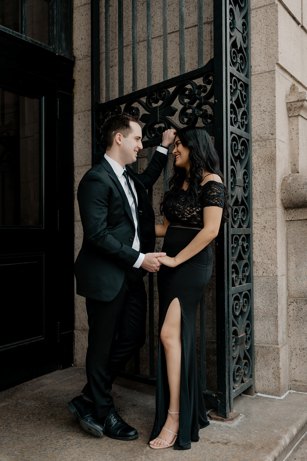 stunning couple pose with the beautiful Boston architecture in the background 