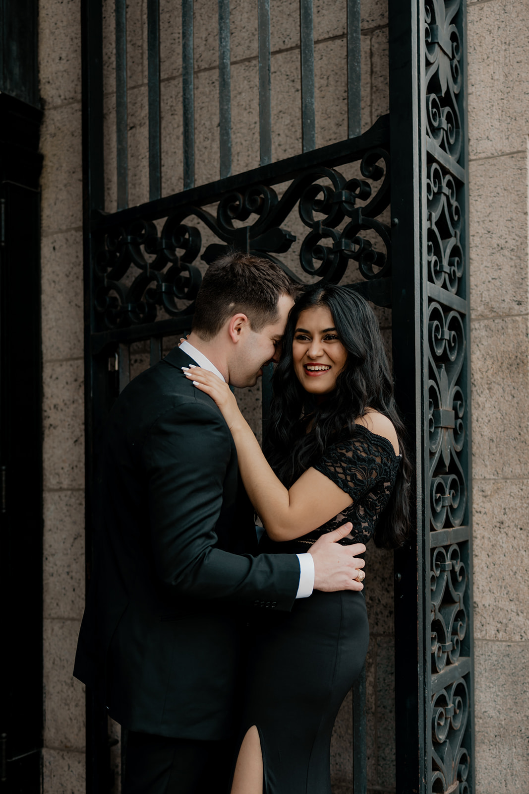 stunning couple pose with the beautiful Boston architecture in the background 