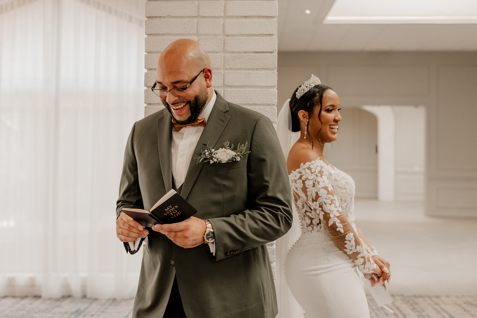 beautiful couple do a private vow and first touch ceremony around a corner 