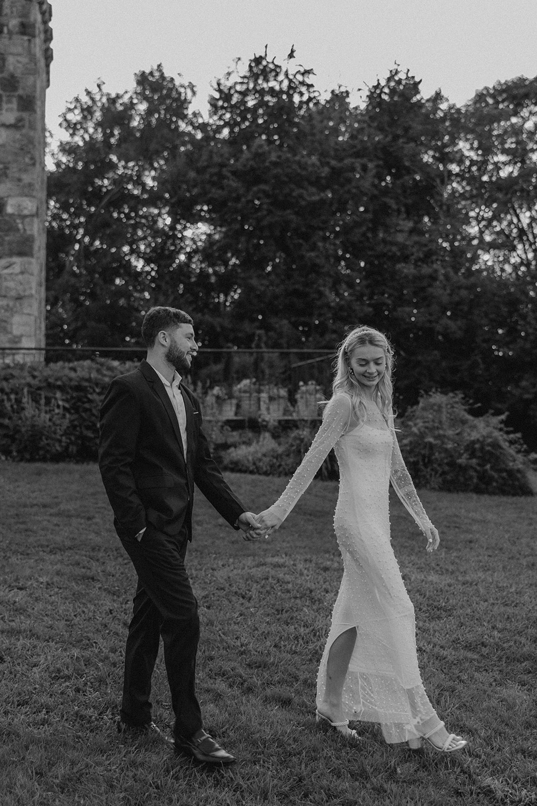 bride and groom walking together 