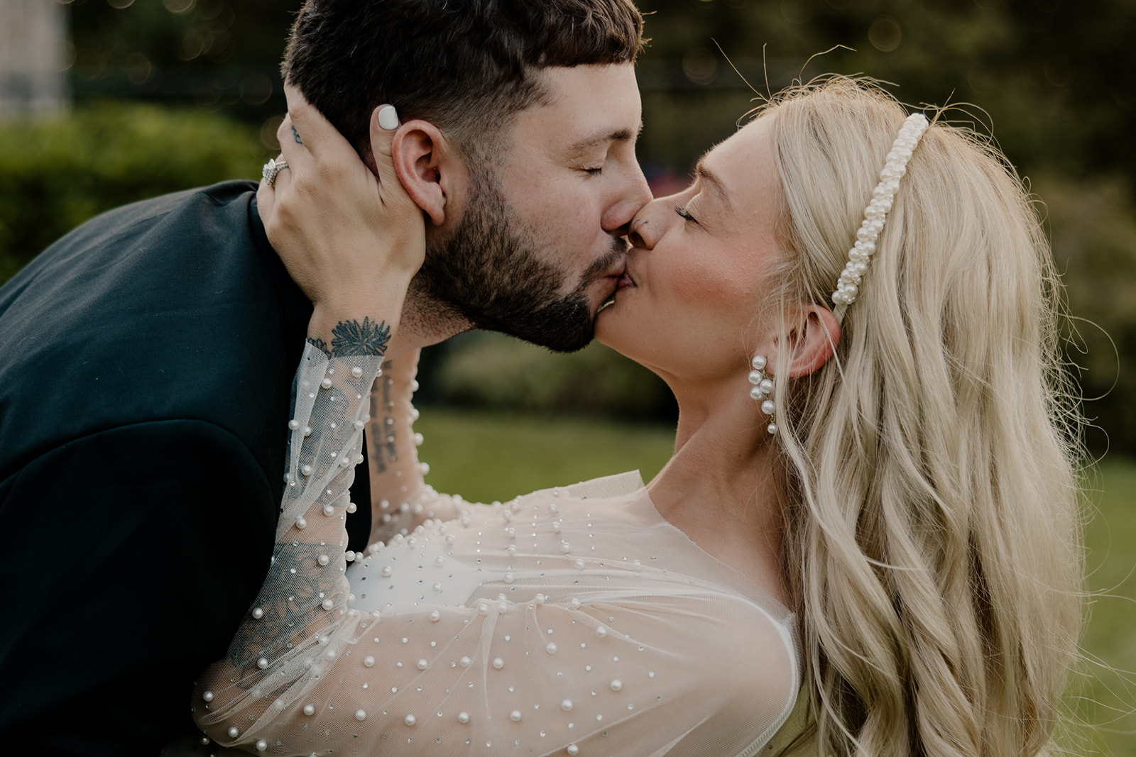 bride and groom share a kiss during their day after wedding session 