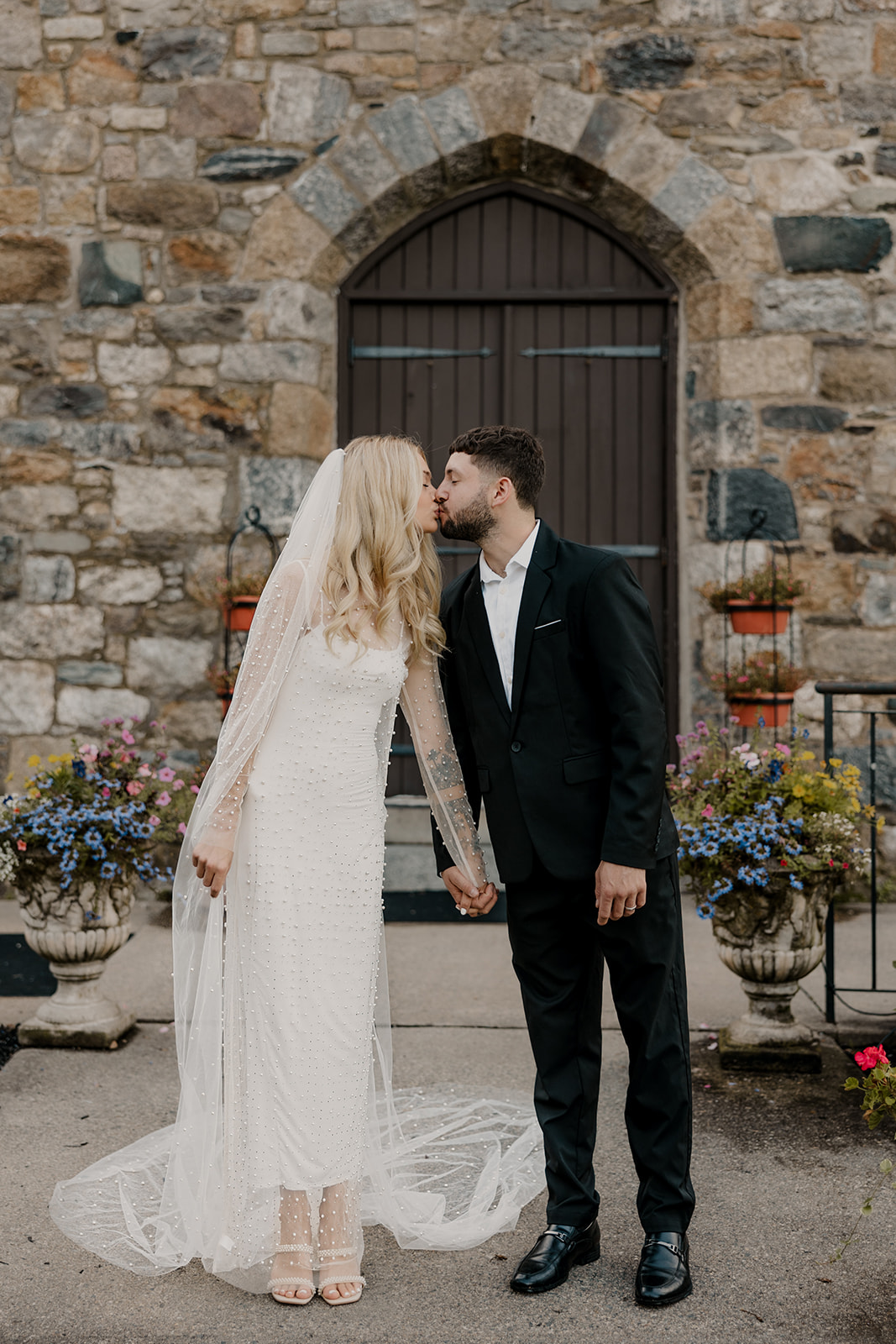 bride and groom share a kiss during their day after wedding session 