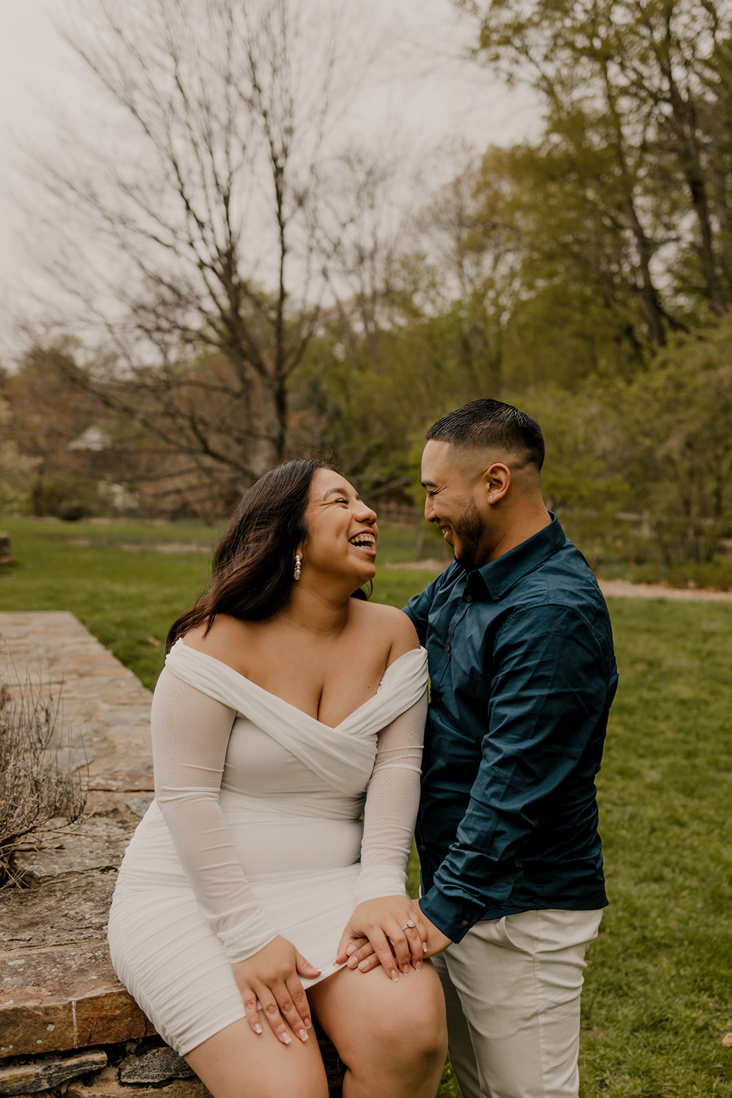 beautiful couple pose together during their Boston engagement photoshoot