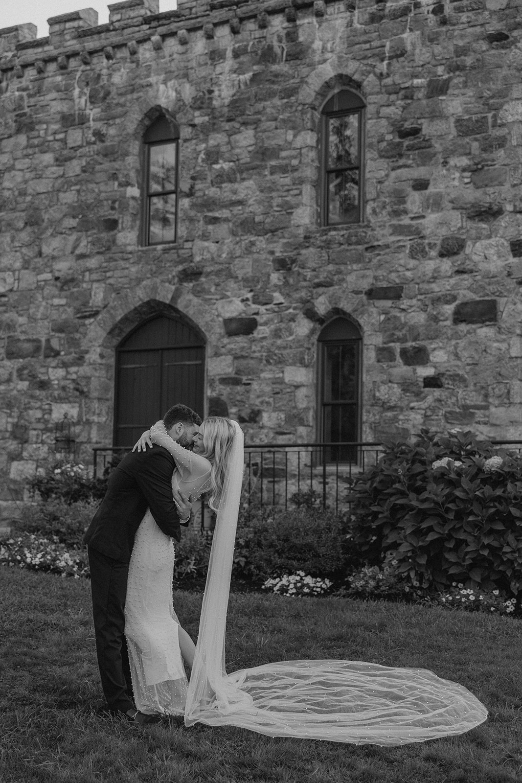 bride and groom share a kiss during their day after wedding session 