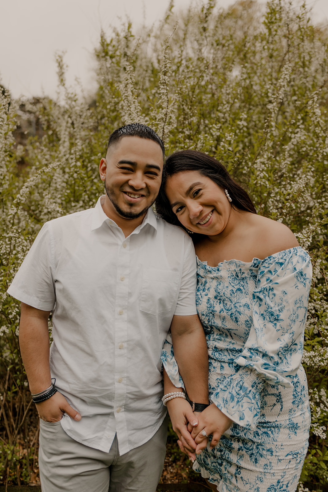 beautiful couple pose together during their Boston engagement photoshoot