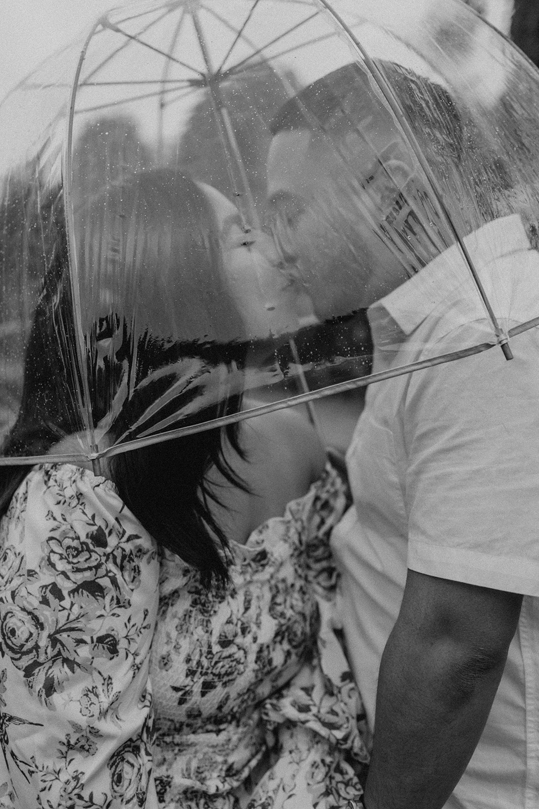 beautiful couple pose together during their Boston engagement photoshoot