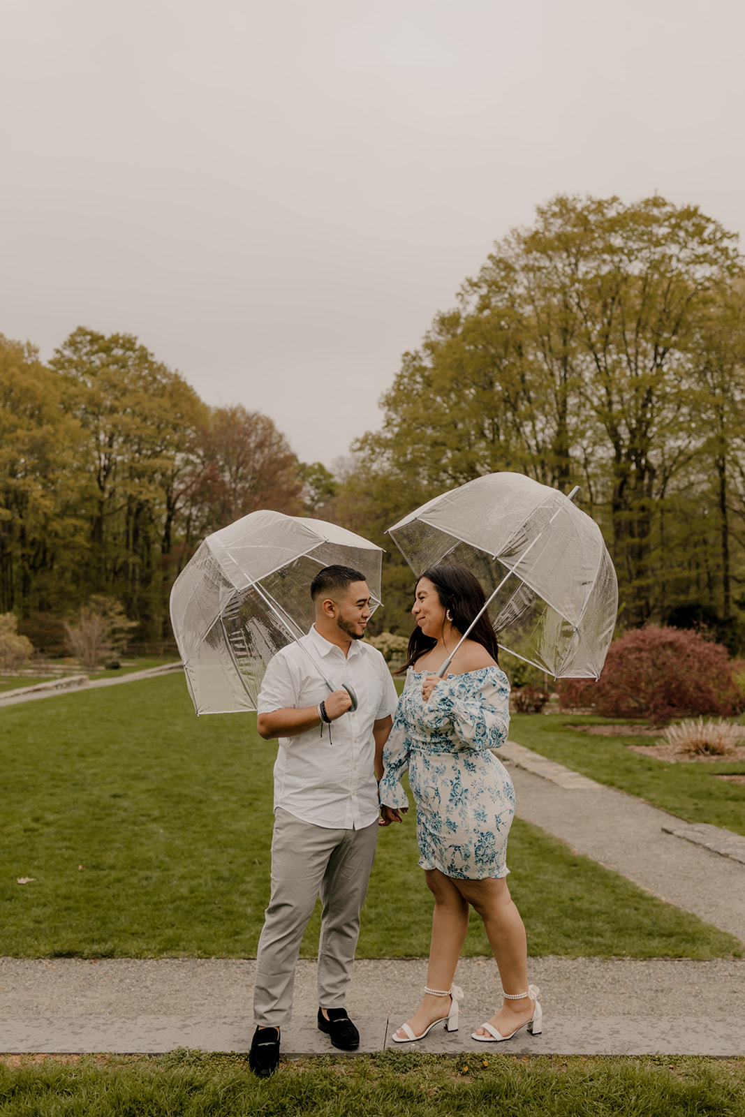 beautiful couple pose together during their Boston engagement photoshoot