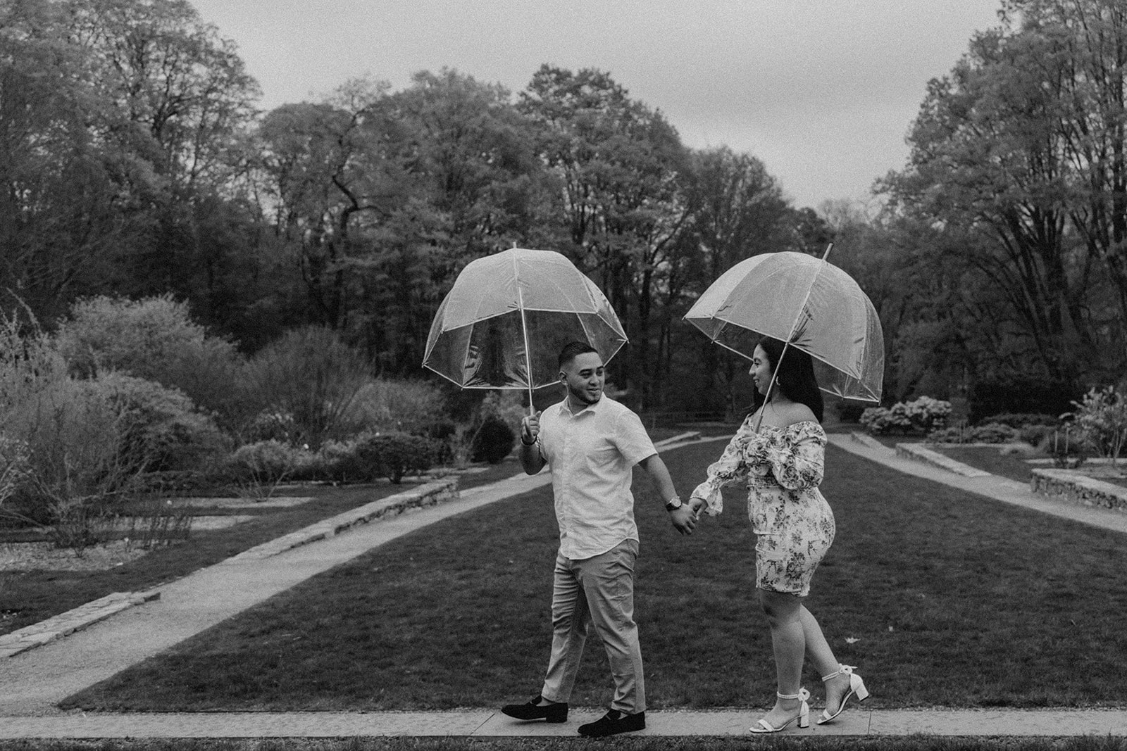 beautiful couple pose together during their Boston engagement photoshoot