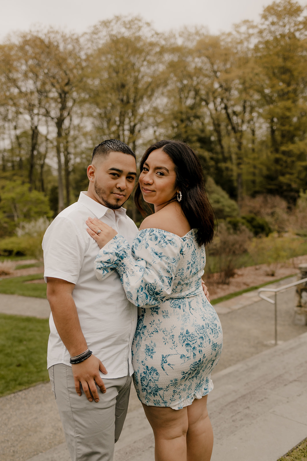 beautiful couple pose together during their Boston engagement photoshoot