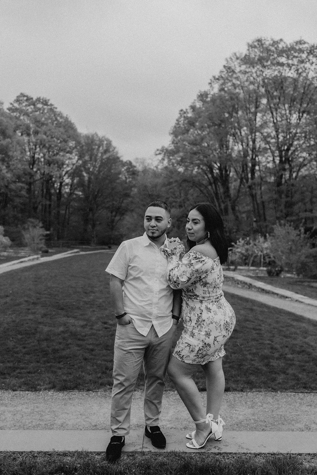 beautiful couple pose together during their Boston engagement photoshoot