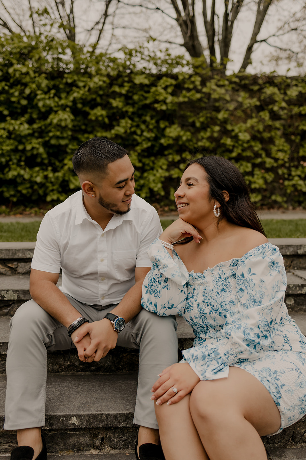 beautiful couple pose together during their Boston engagement photoshoot