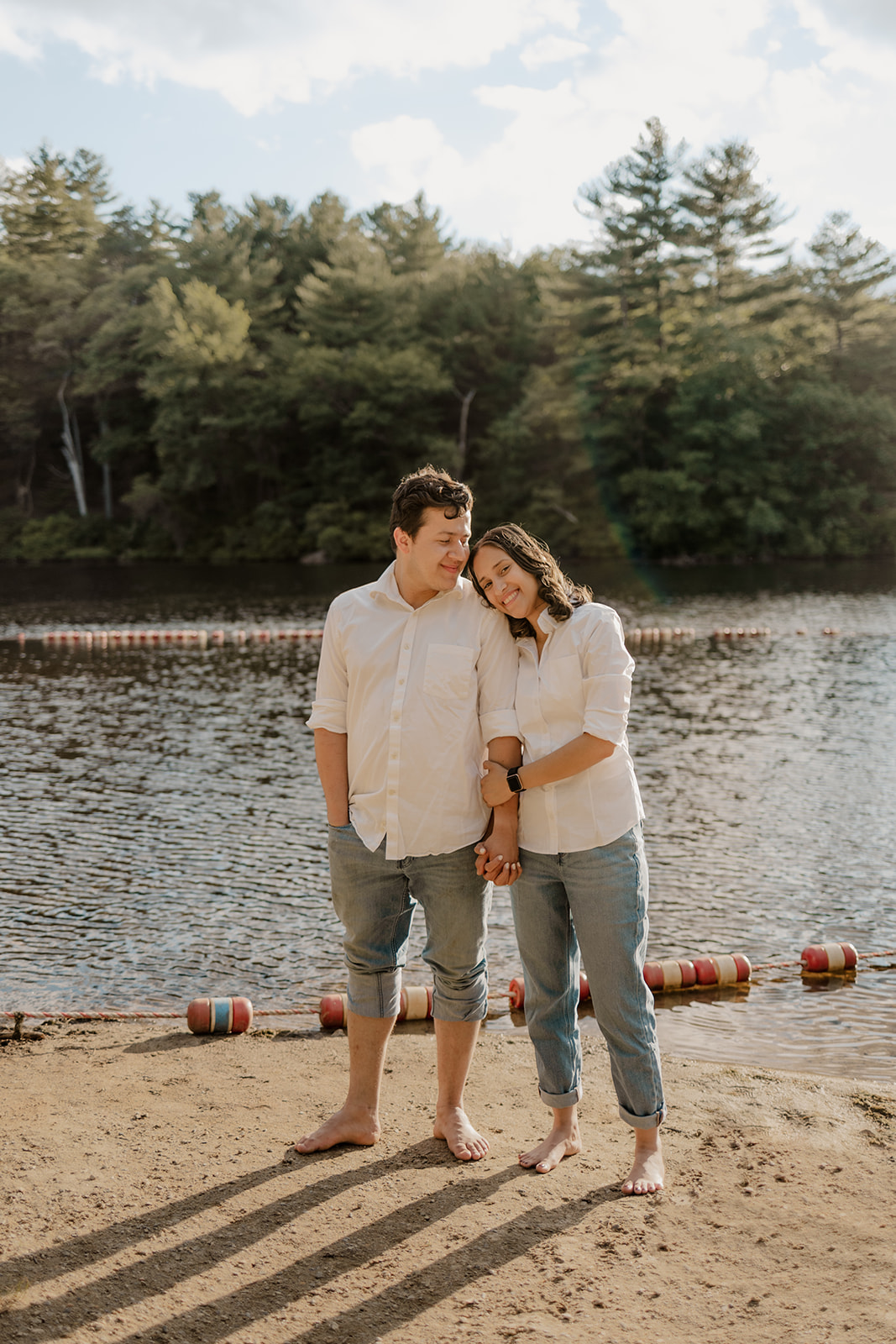 beautiful couple pose on the beach