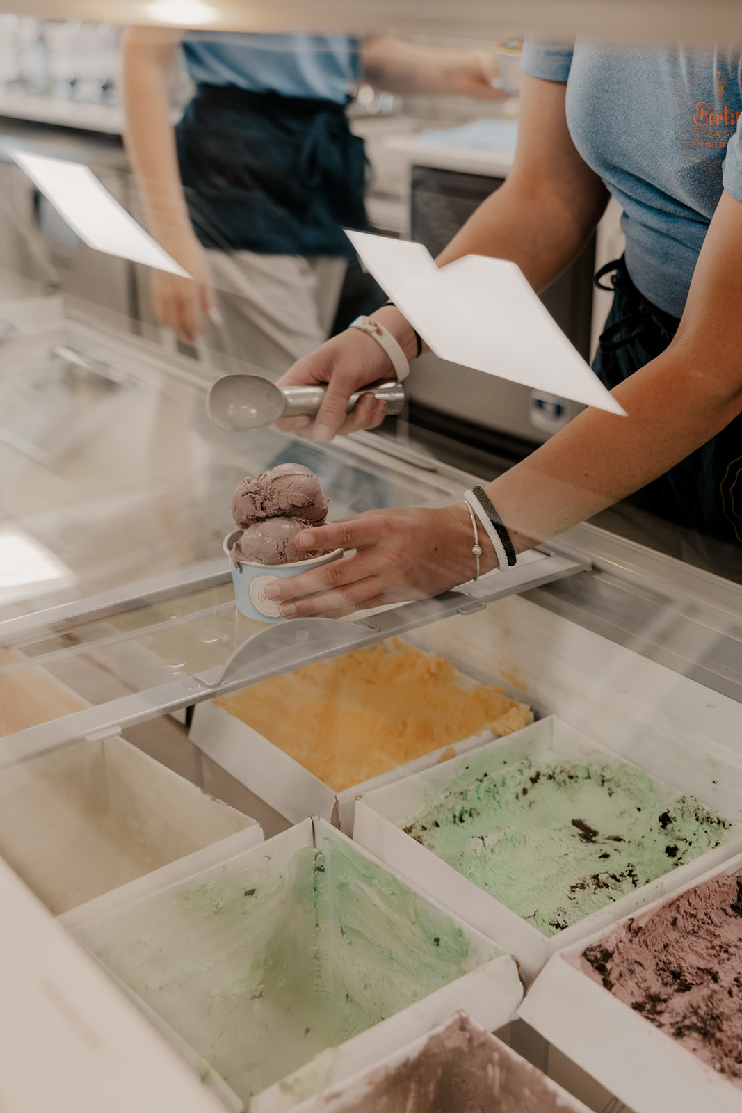 family eats ice cream together after their stunning Boston summer elopement