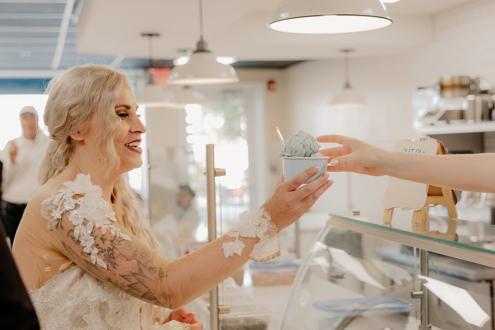 family eats ice cream together after their stunning Boston summer elopement