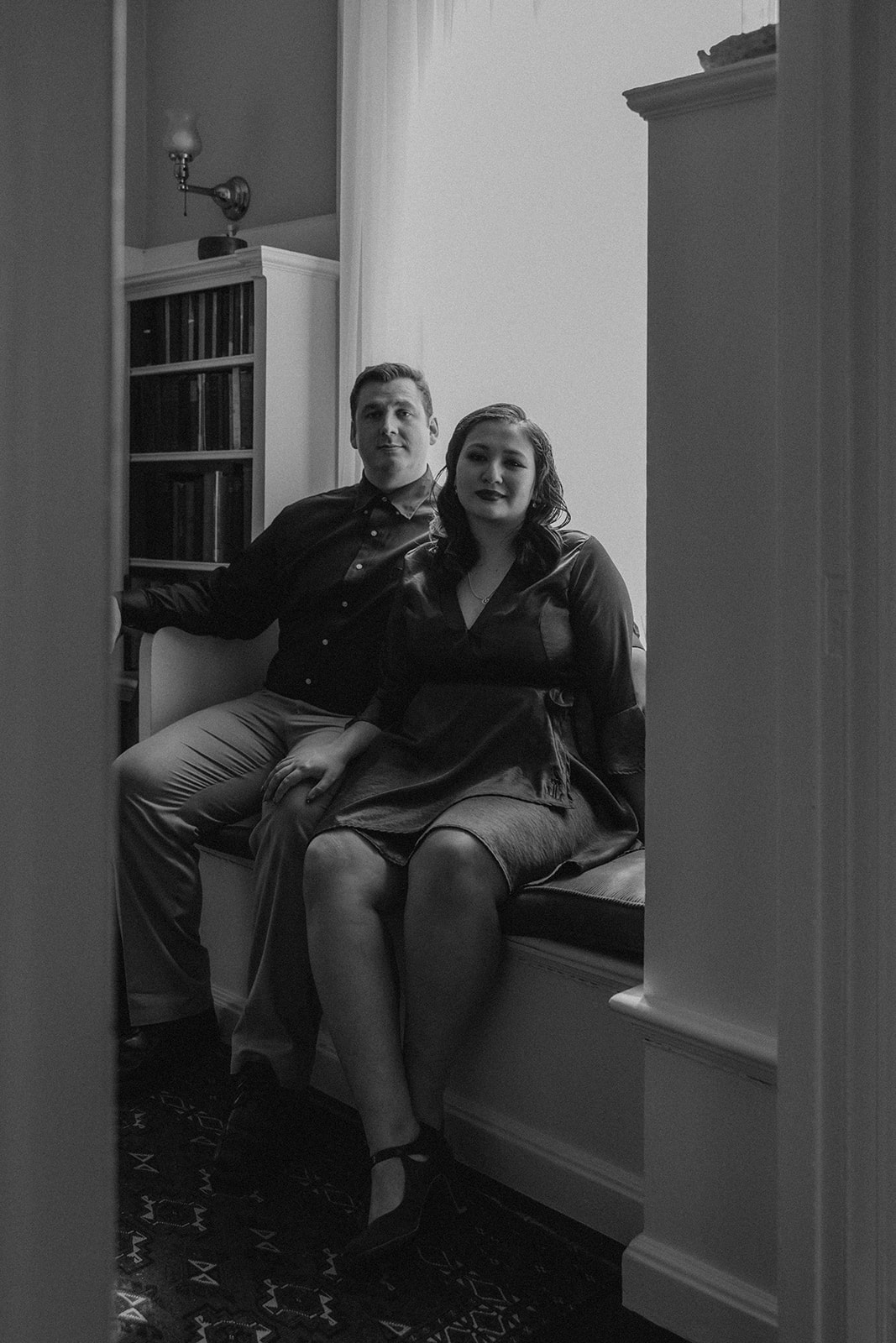 beautiful couple pose together during their Nichols House museum engagement photoshoot in Boston