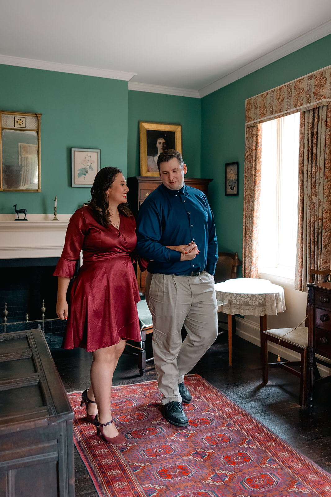 beautiful couple pose together during their Nichols House museum engagement photoshoot in Boston