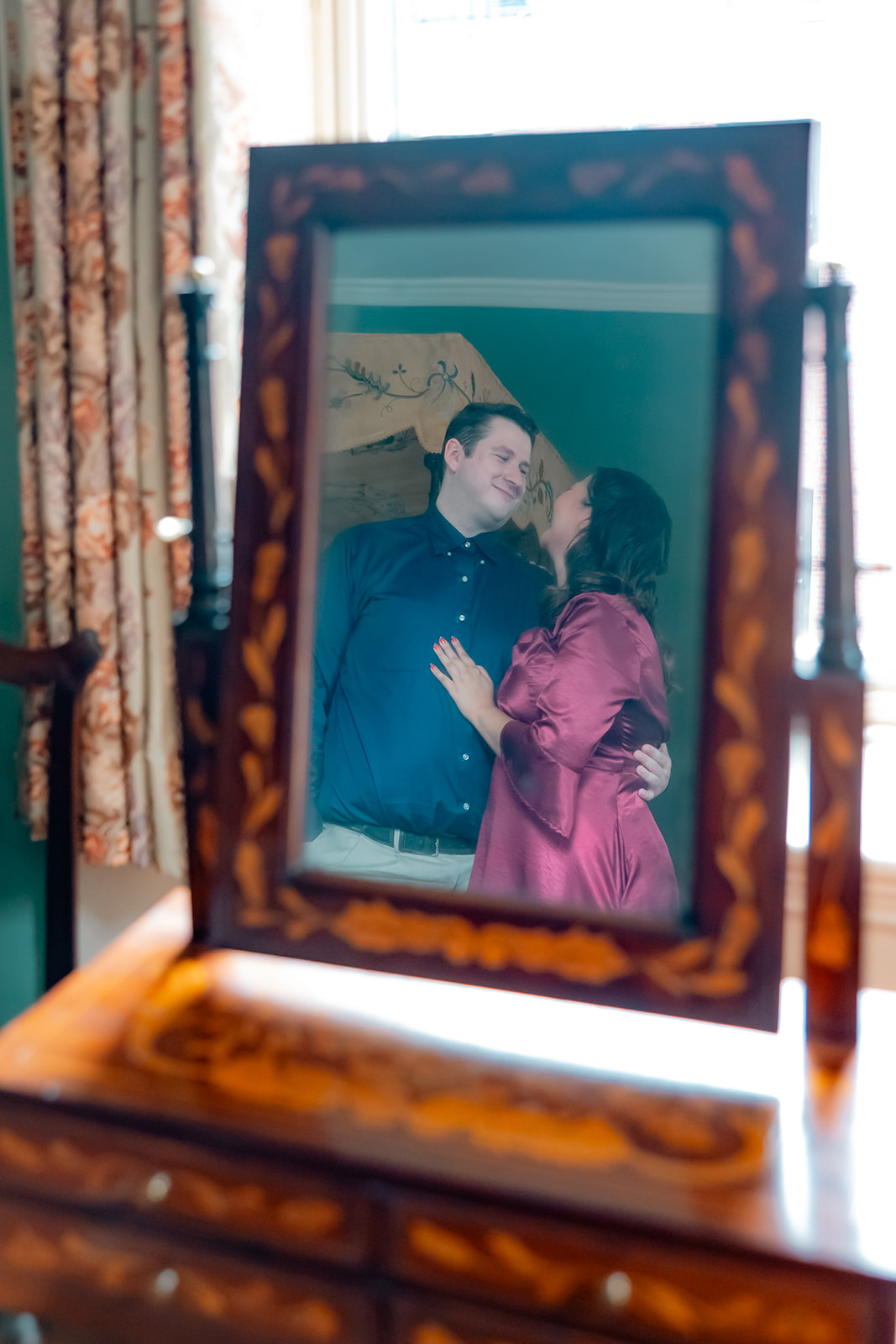 beautiful couple pose together during their Nichols House museum engagement photoshoot in Boston