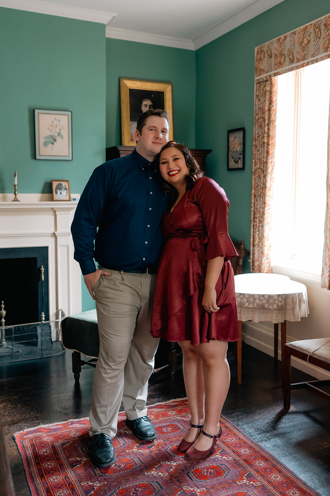 beautiful couple pose together during their Nichols House museum engagement photoshoot in Boston