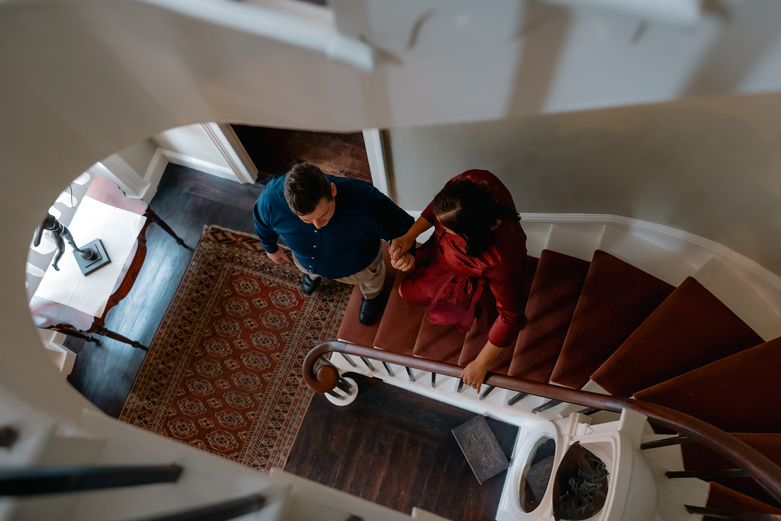 beautiful couple pose together during their Nichols House museum engagement photoshoot in Boston