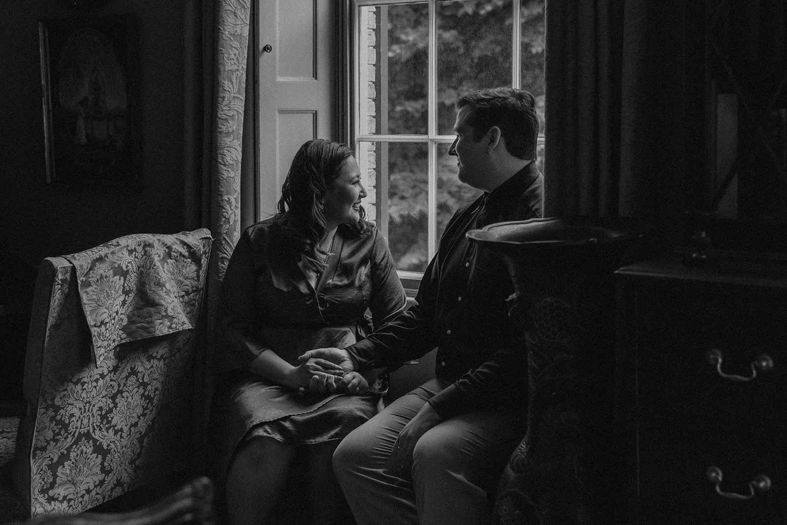 beautiful couple pose together during their Boston engagement photoshoot