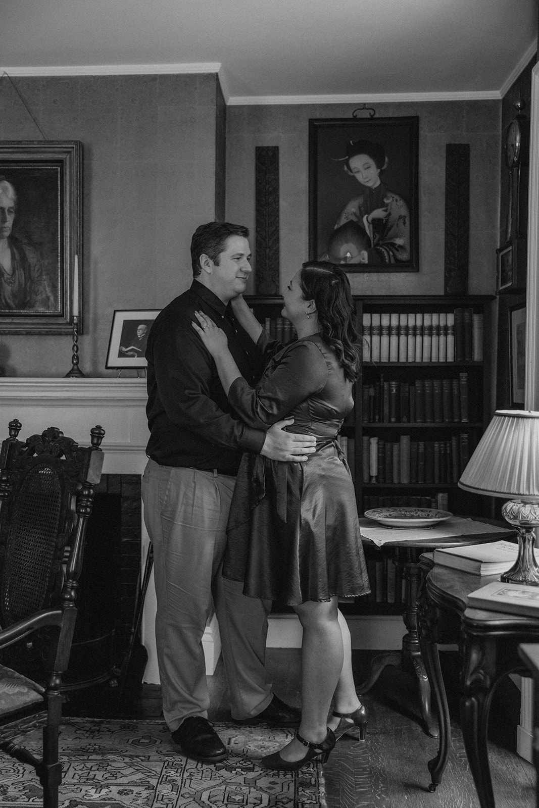 beautiful couple pose together during their Nichols House museum engagement photoshoot in Boston