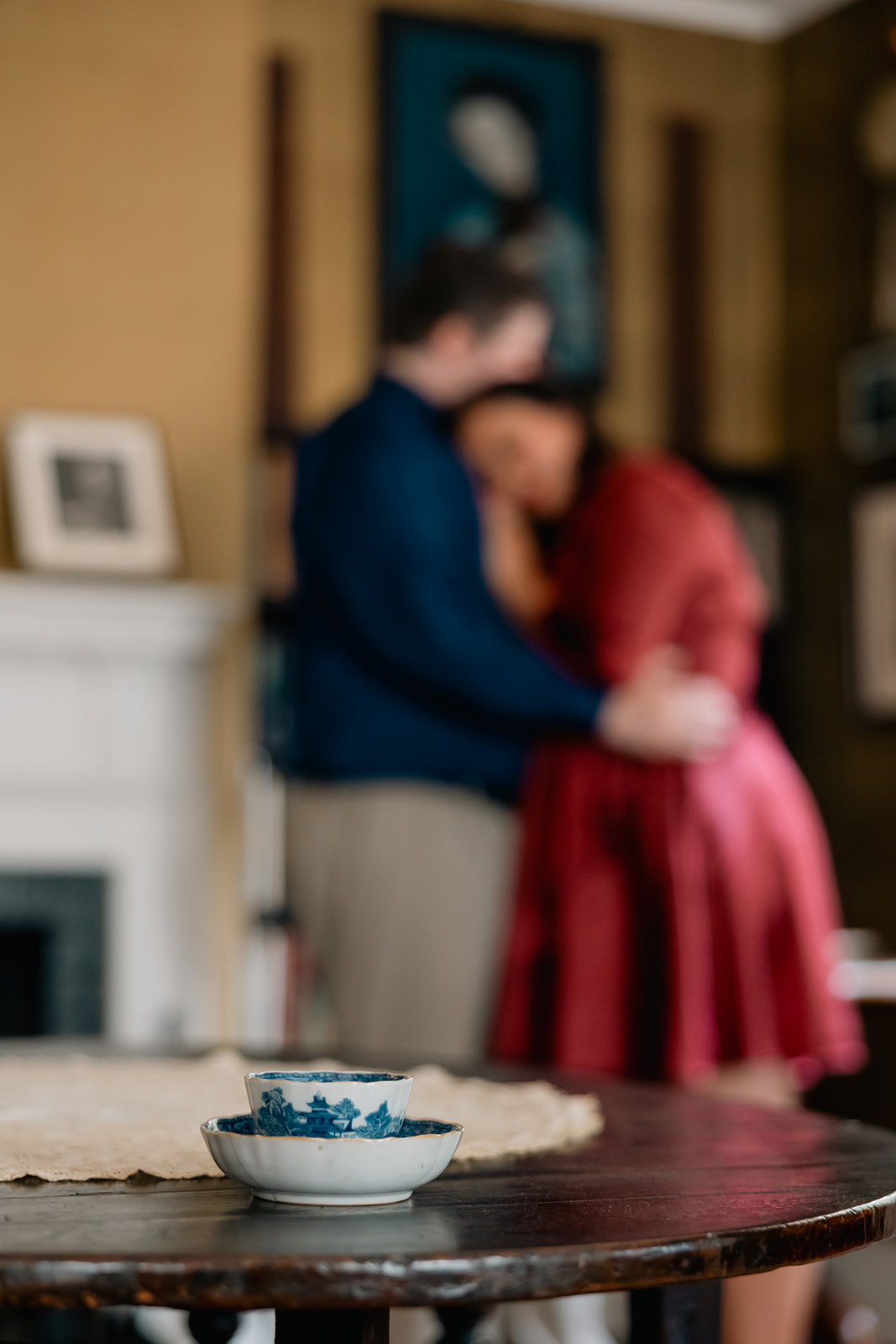 beautiful couple pose together during their Nichols House museum engagement photoshoot in Boston