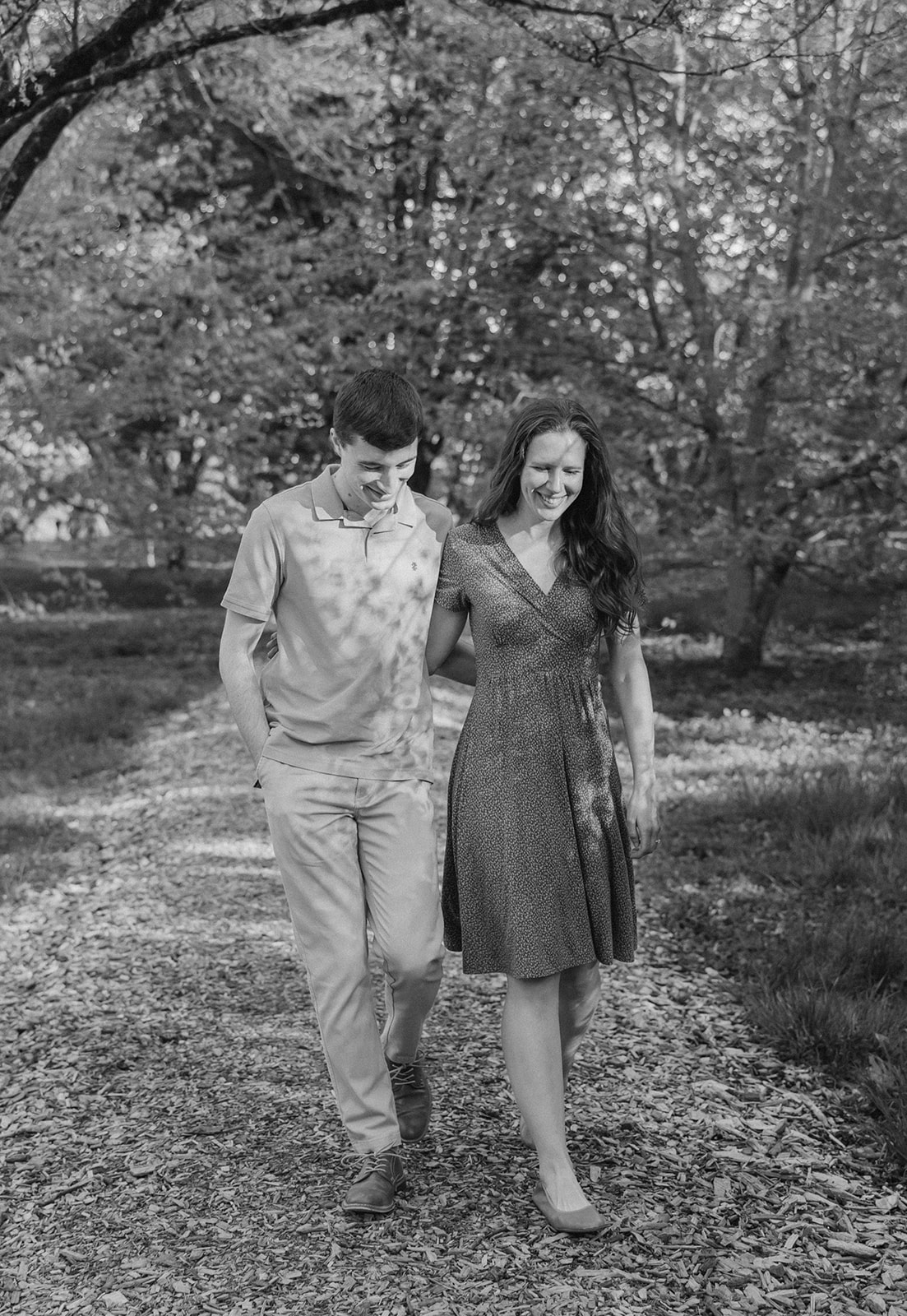 beautiful couple pose together during their Boston engagement photoshoot