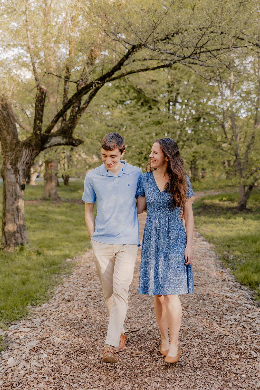 beautiful couple pose together during their Boston engagement photoshoot