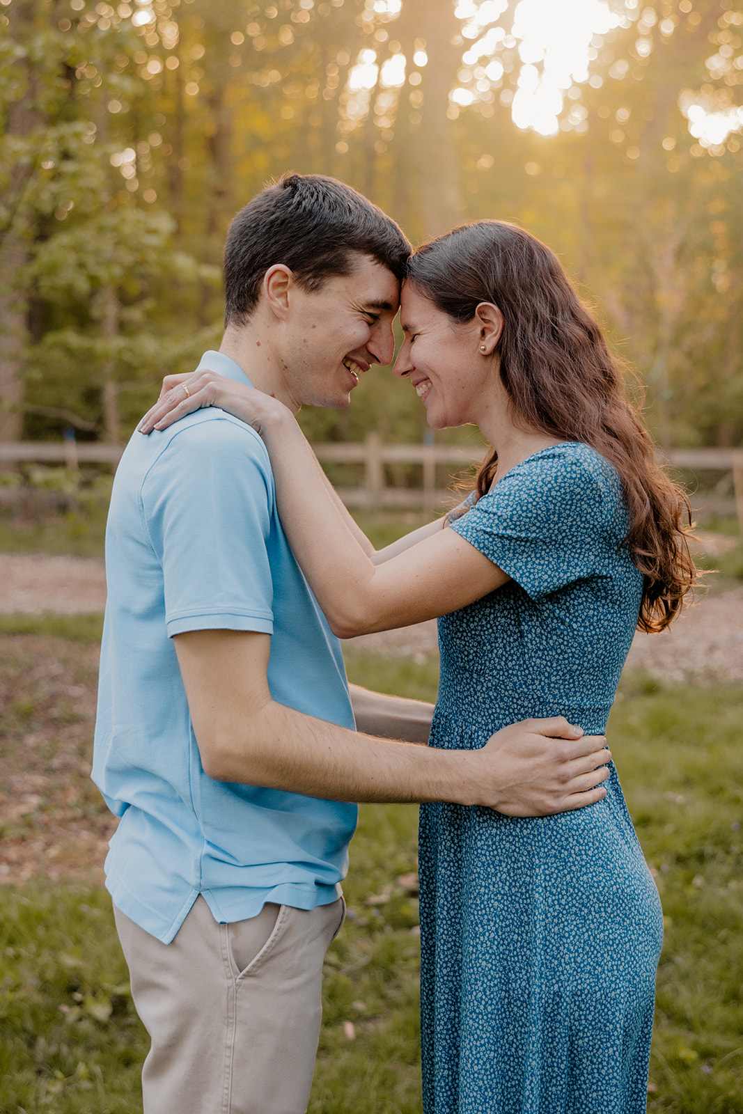 gorgeous couple take candid engagement photos during their Harvard arboretum engagement photos