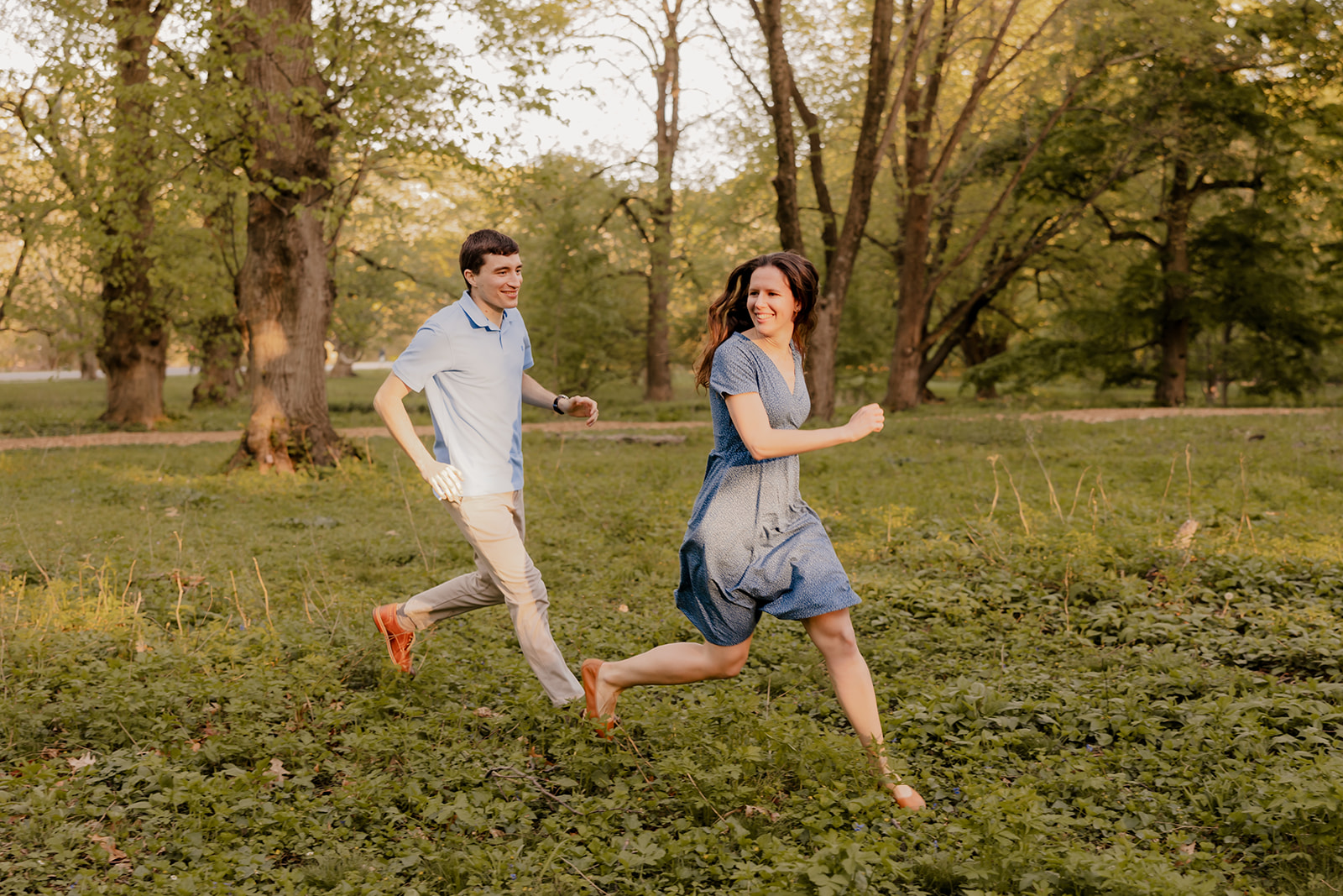 gorgeous couple take candid engagement photos during their Harvard arboretum engagement photos