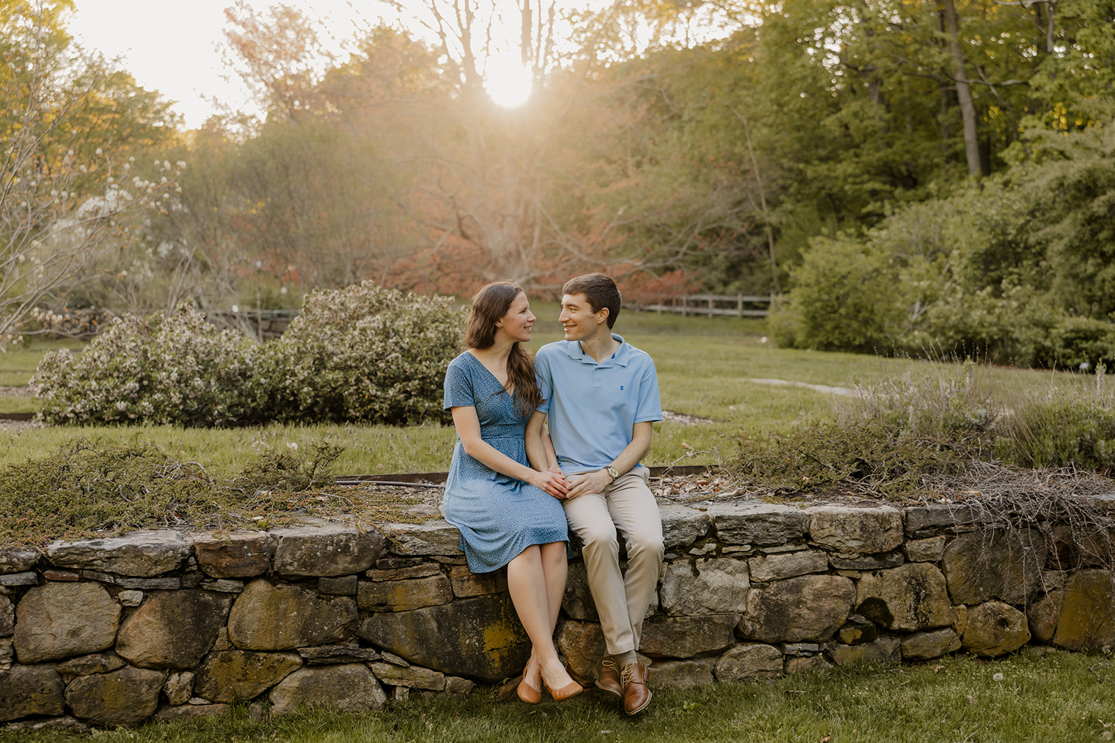 beautiful couple pose together during their Boston engagement photoshoot