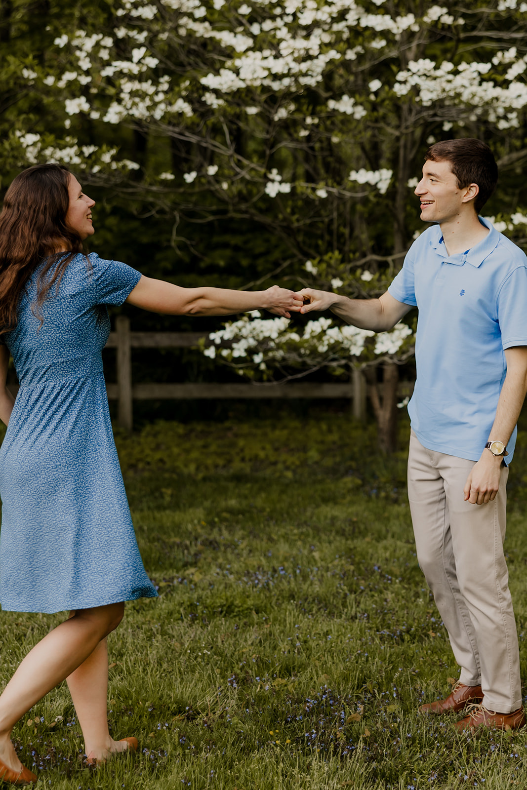 stunning couple dance together during their Harvard arboretum engagement photoshoot