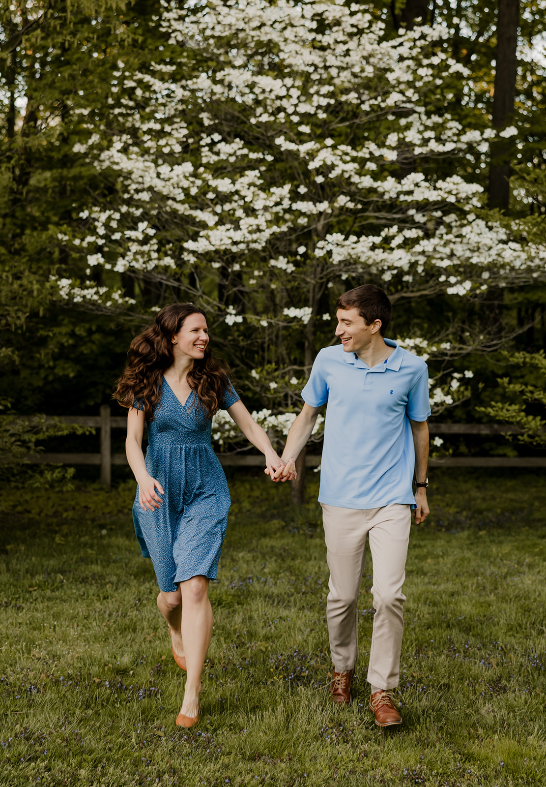 beautiful couple pose together during their Boston engagement photoshoot