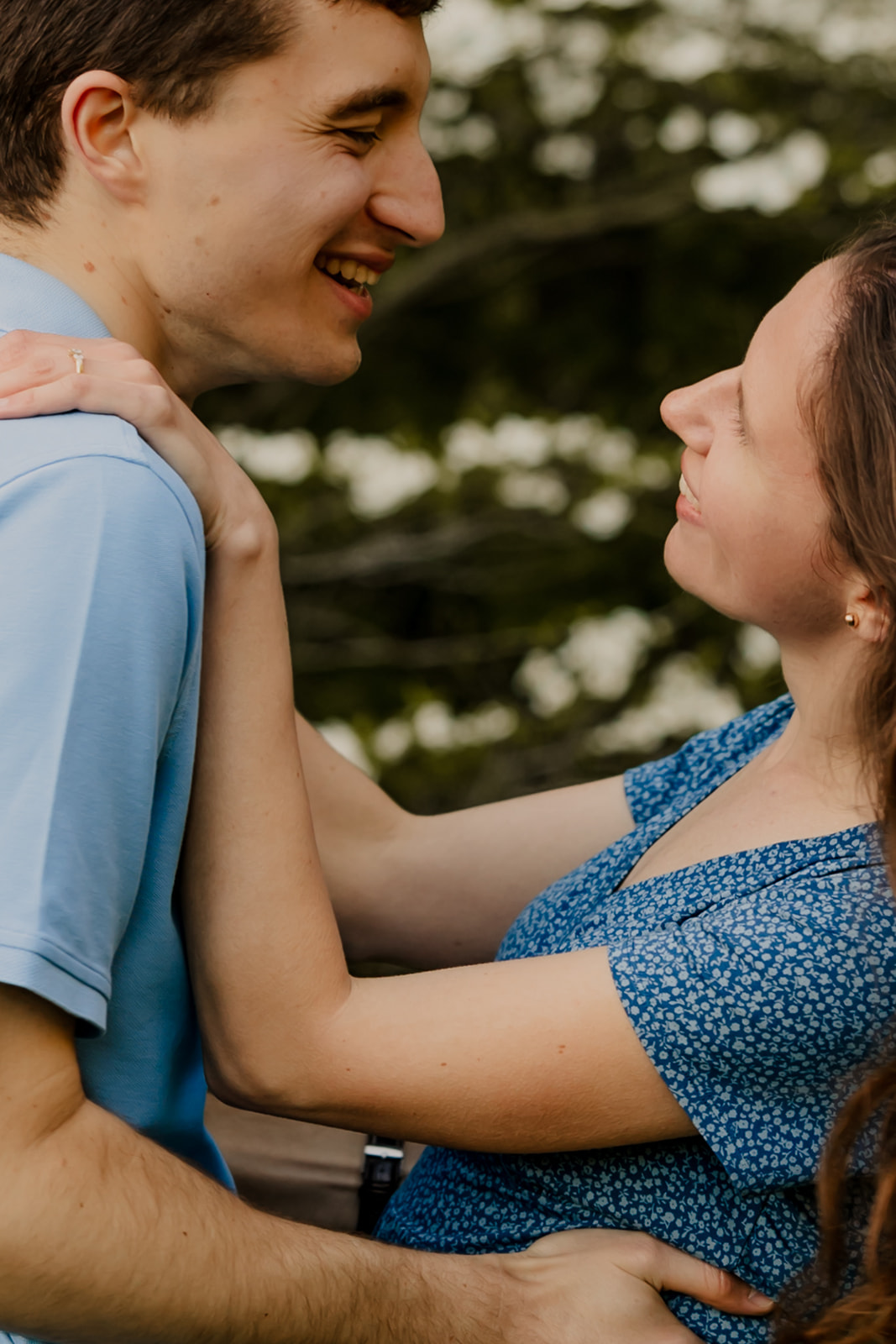 beautiful couple pose together during their Boston engagement photoshoot