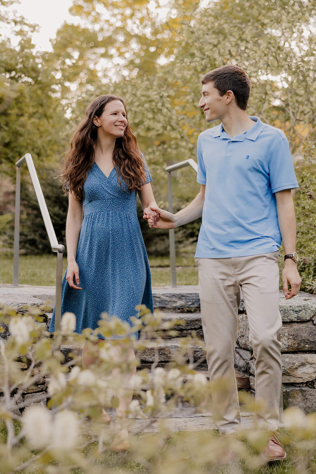 beautiful couple pose together during their Boston engagement photoshoot