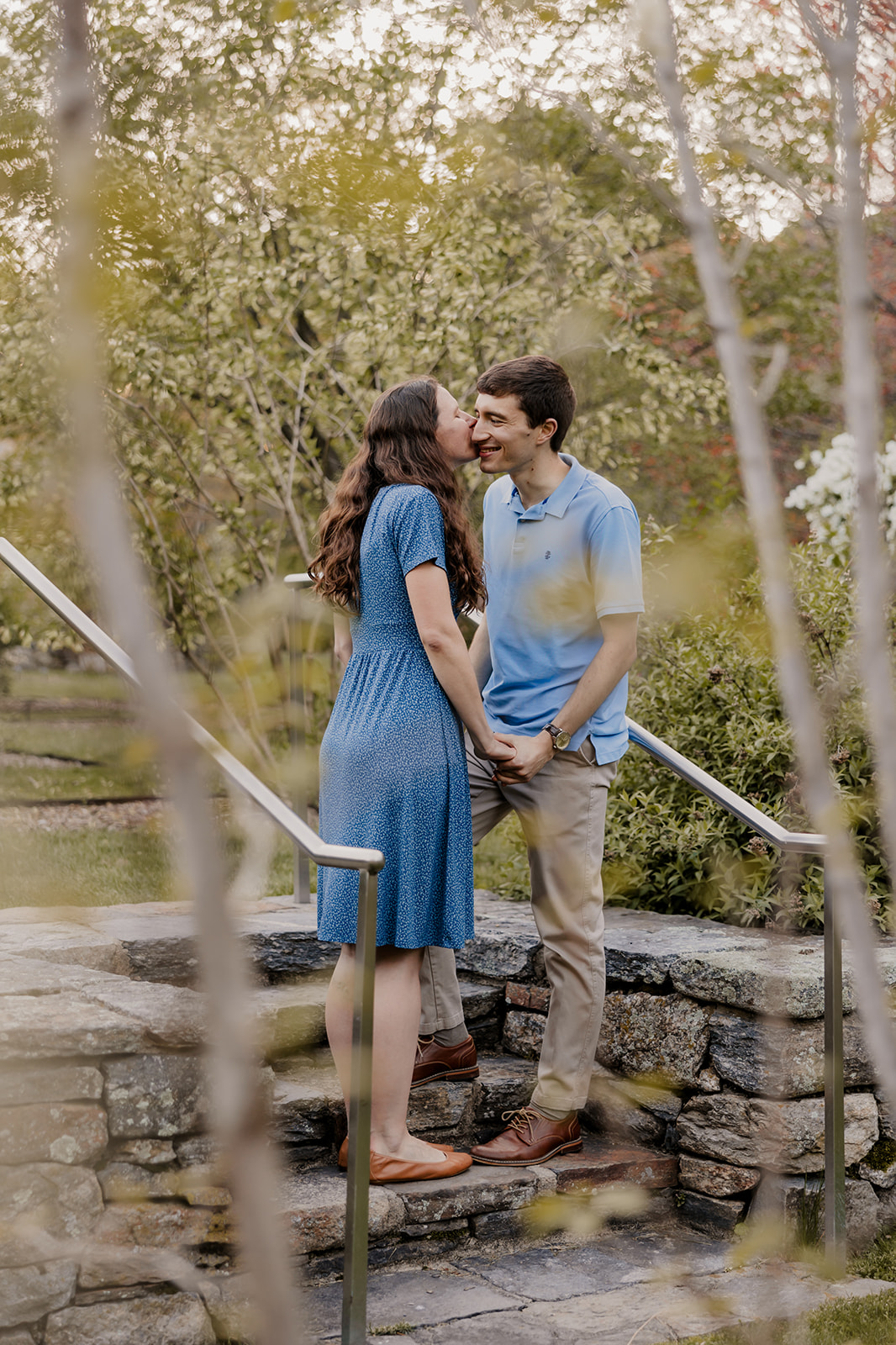 beautiful couple pose together during their Boston engagement photoshoot