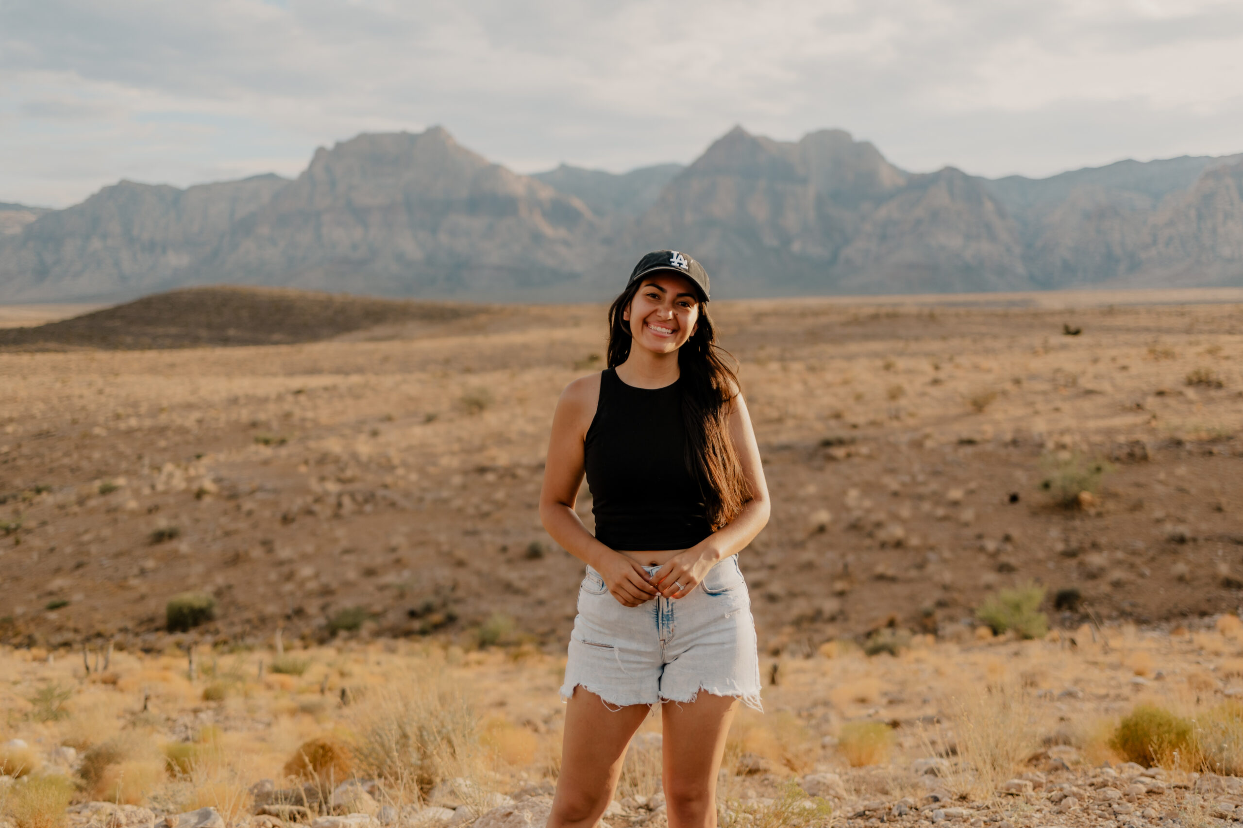 Paula poses with the desert in the background