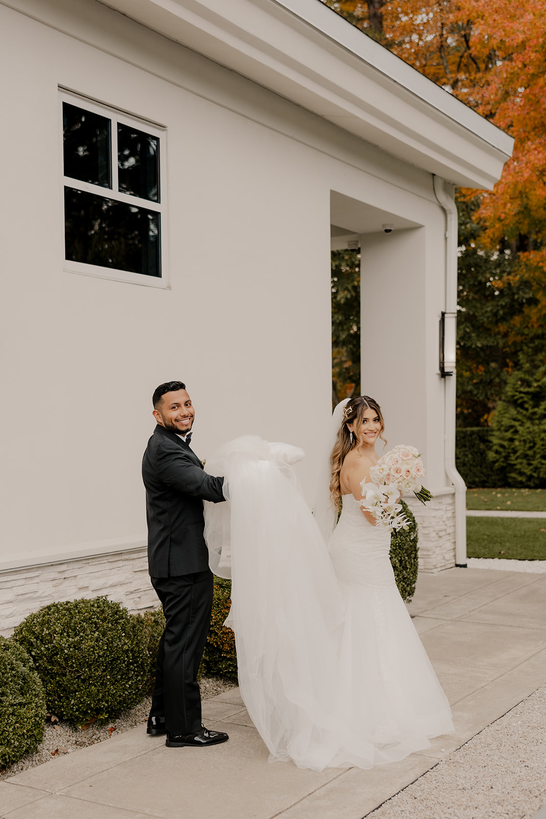 beautiful bride and groom pose together after their dreamy Fall Boston wedding day