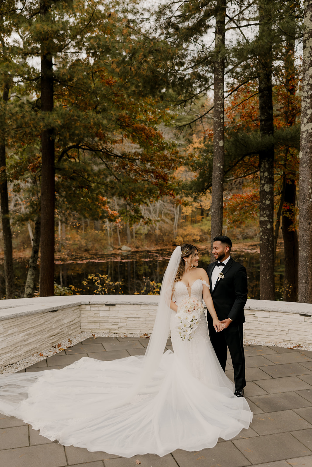 beautiful bride and groom pose together after their dreamy Fall Boston wedding day