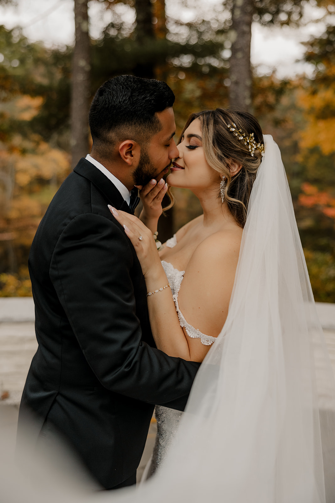 beautiful bride and groom pose together after their dreamy Fall Boston wedding day